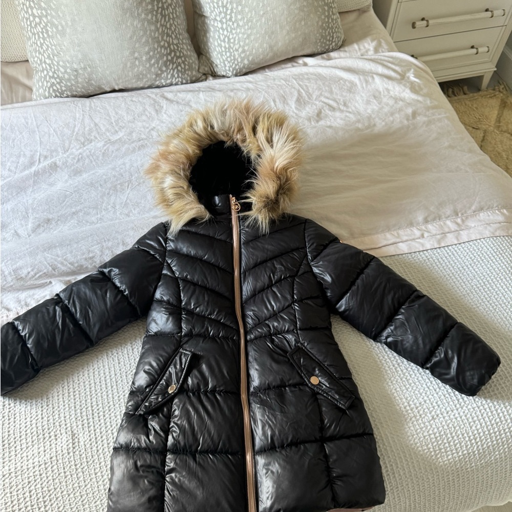 Gently used Kids size 10 puffy coat with faux fur. excellent condition